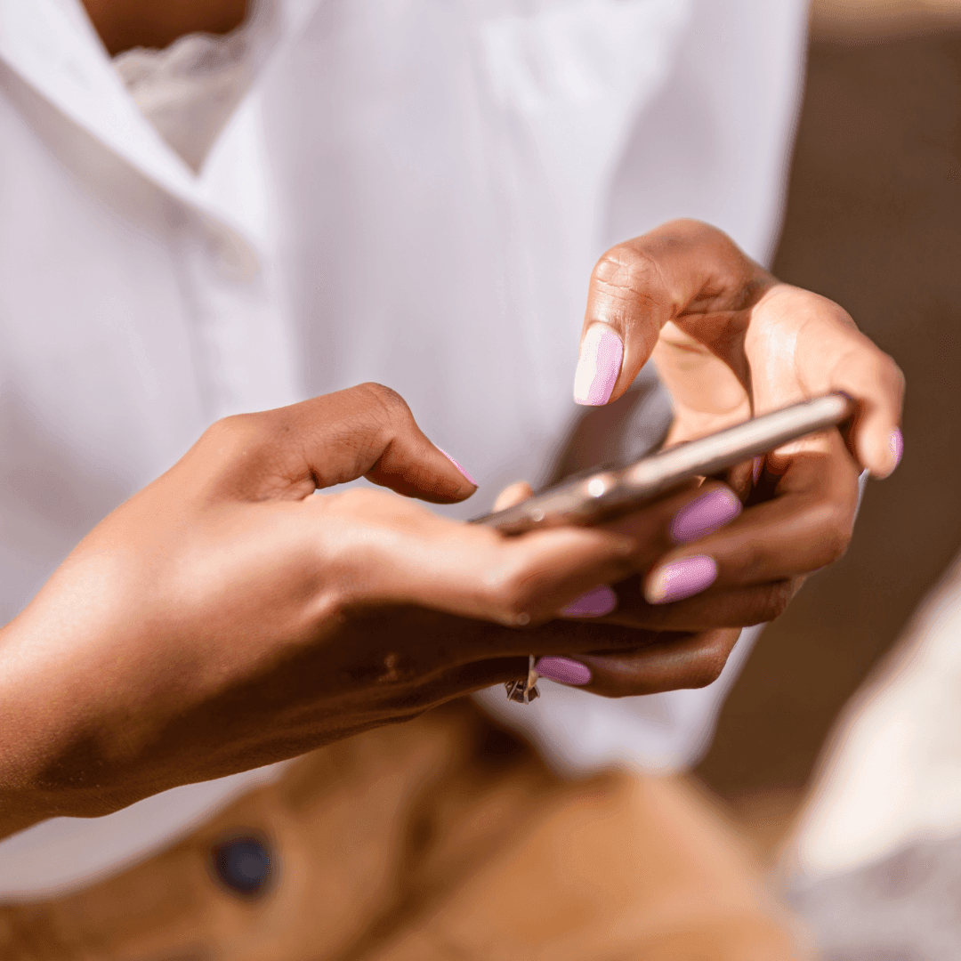 Woman holding phone for social media