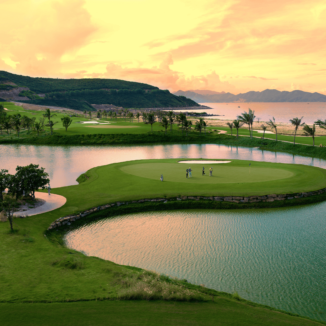 Golf Cours with players at sunset